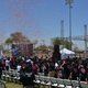 An ICE agent looks on as confetti flies and Andy Ruiz Jr. is handed the key to the city.